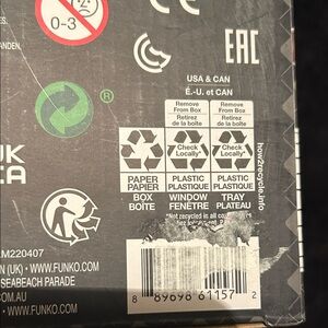 Funko Black and White Packaging with Recycling Symbols
